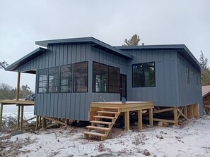 Sunroom with a view of the lake