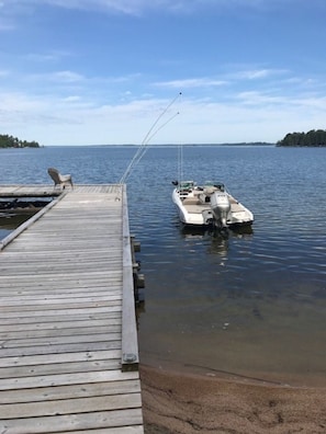 Dock with mooring whips. 21' Triton attached.