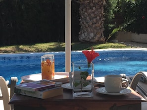 Relaxing by the pool