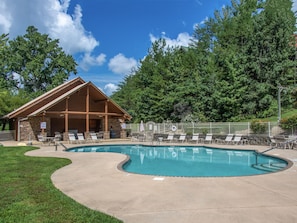 Don’t forget your swimsuit - Among Woodland Escape’s many amenities is free access to the community swimming pool in the summer, a sizable paved driveway, and a park-style charcoal grill.