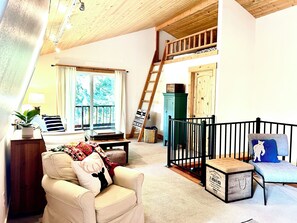 Upstairs livingroom/ library/ ladder to loft bedroom