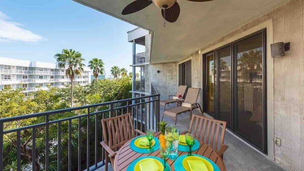 The private balcony has an outdoor dining table for four...