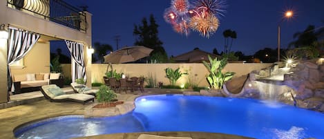 Backyard with close view of fireworks display