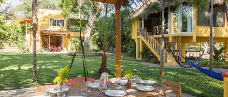 BBQ area view to the gardens and villa