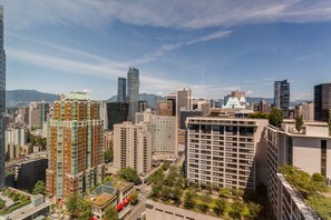 Panoramic views through floor-to-ceiling and wall-to-wall windows