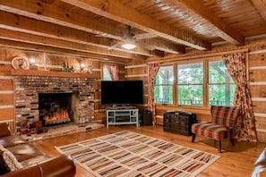 Spacious living room with flatscreen t.v. and large dvd collection