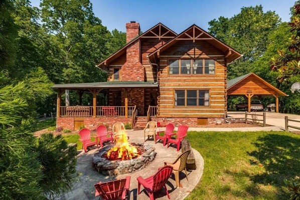Side view of home with firepit