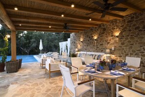 Indoor/outdoor living space next to the pool
