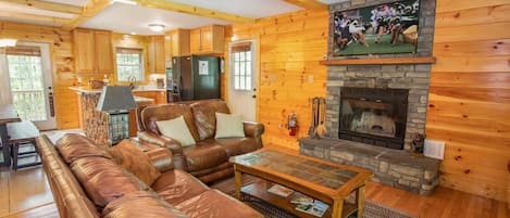 Stone Fireplace with Flatscreen TV in Living Room