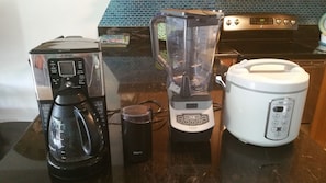 Fully stocked kitchen. Rice cooker, food processor, coffee grinder & maker.