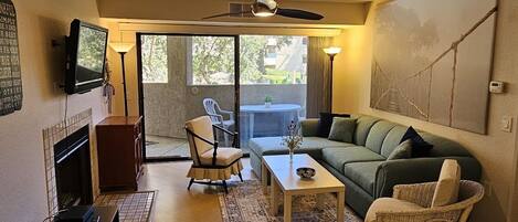 Living room with sliding door to balcony

