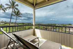 Relax and enjoy the view and the breeze on the private lanai.
