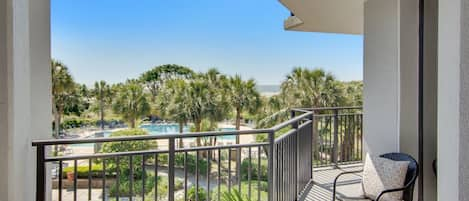 Ocean and pool views from the balcony.