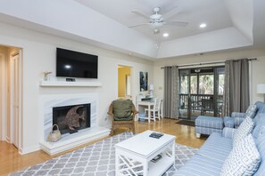Living Room Showing Television and Desk Area
