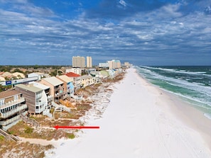 Direct beach access to the emerald waters of the Gulf of Mexico