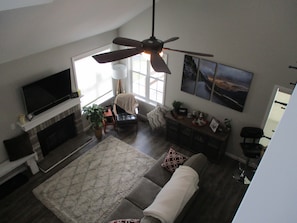 Living room picture taken from up in the loft area.
