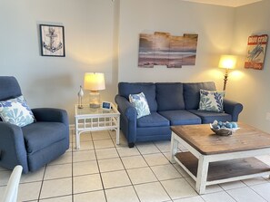 Full size living room with plenty of seating.