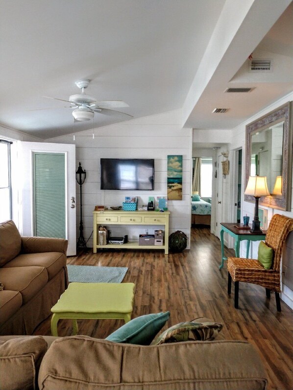 Spacious open living space with high ceiling