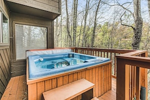 After a long day spent out and about, guests can unwind in the large hot tub.
