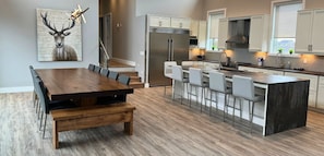 Fully-Equipped Kitchen and Dining Area on the Upper Level