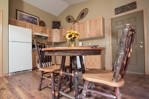 Rustic hickory dining table in your full kitchen.
