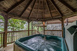Hot tub on covered gazebo