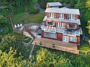 The barbecue area, fire pit, and stairway down to the private beach are located on the northwest corner of the home.

*Fire pits are not usable from May 1st-September 30th due to county burn ban and safety of property and neighboring areas.