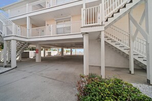Front of the beachfront building at the complex. This unit is lo - Front of the beachfront building at the complex. This unit is located on the top floor.