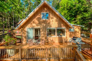 Water-facing deck of Main cabin with mini-me cabin shown behind and to the left