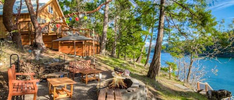 Enjoy all that Neil Bay has to offer from this beautiful cabin 
*Fire pits are not usable from May 1st-September 30th due to county burn ban and safety of property and neighboring areas. Ban is usually lifted October 1st if/when conditions and weather are favorable. Firewood not provided.