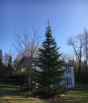 Back left of the cottage - deck extends from front to back - sun any time of day!