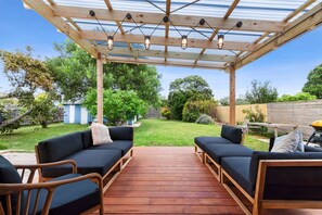 spacious backyard - perfect for a game of catch with the pups, fully fenced