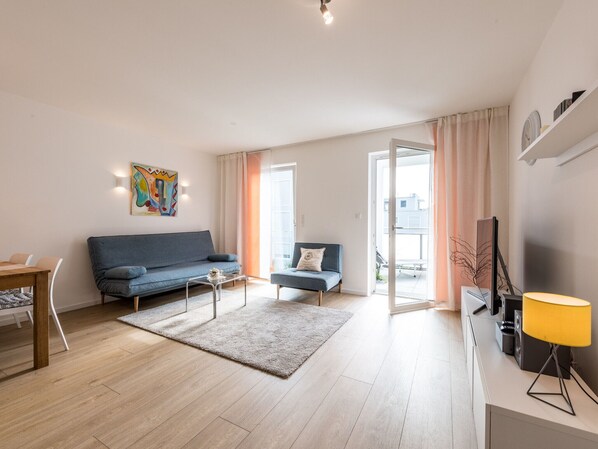 Ferienwohnung 61 qm, 1 Schlafzimmer und Balkon mit Blick auf den Kurpark-Wohnraum