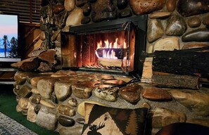 The wood-burning fireplace in the cabin is a true centerpiece, offering both warmth and charm to the space. Make sure to bring your own wood.
