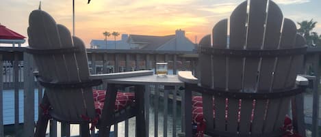 Casa FRIO Sunset views from comfortable Polywood deck high chairs.