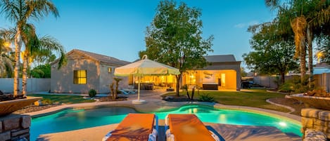 Backside of pool looking back at house