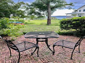 Shady patio just outside the bay room door.  Perfect for morning coffee time.