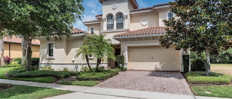 Front of the property with plenty of parking 