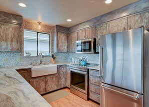 Newly remodeled kitchen with Jenn-Air and Kitchen Aid appliances.