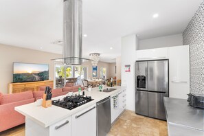 Gorgeous Kitchen of the Apartment in Aruba - Fully equipped - Contemporary design with clean lines and minimalist aesthetics - Open concept connecting the kitchen to the living area