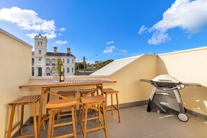 Sit out on the balcony and watch life go by with the Royal Hotel as the backdrop