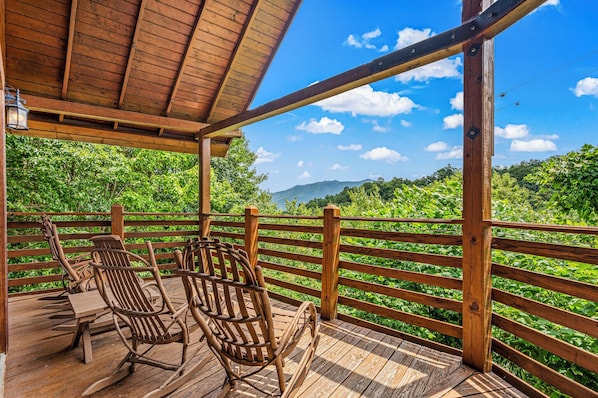 Discover your own private oasis on this expansive deck w/hand-crafted furniture.