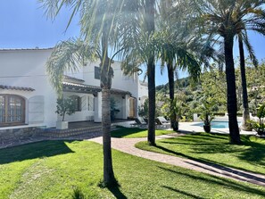 Facade/entrance,Garden,Garden view,Pool view,Swimming pool