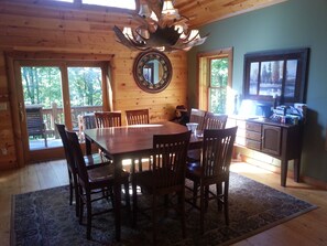 Dining area inside the great room.  Natural lighting with many views!