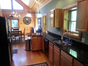 Galley kitchen at IAG with view to the Dining Room