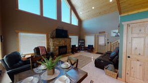Dining room table is adjacent to the living room and kitchen. Perfect for up to 4 people.