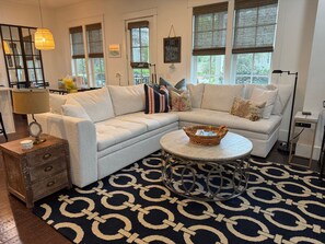 New sofa in open floor plan living room