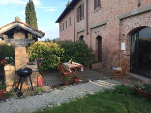 front of the property with well and patio area