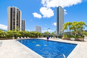 Sun loungers are available by the pool