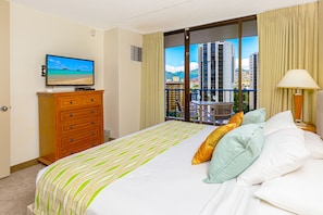 Bedroom with king size bed and TV